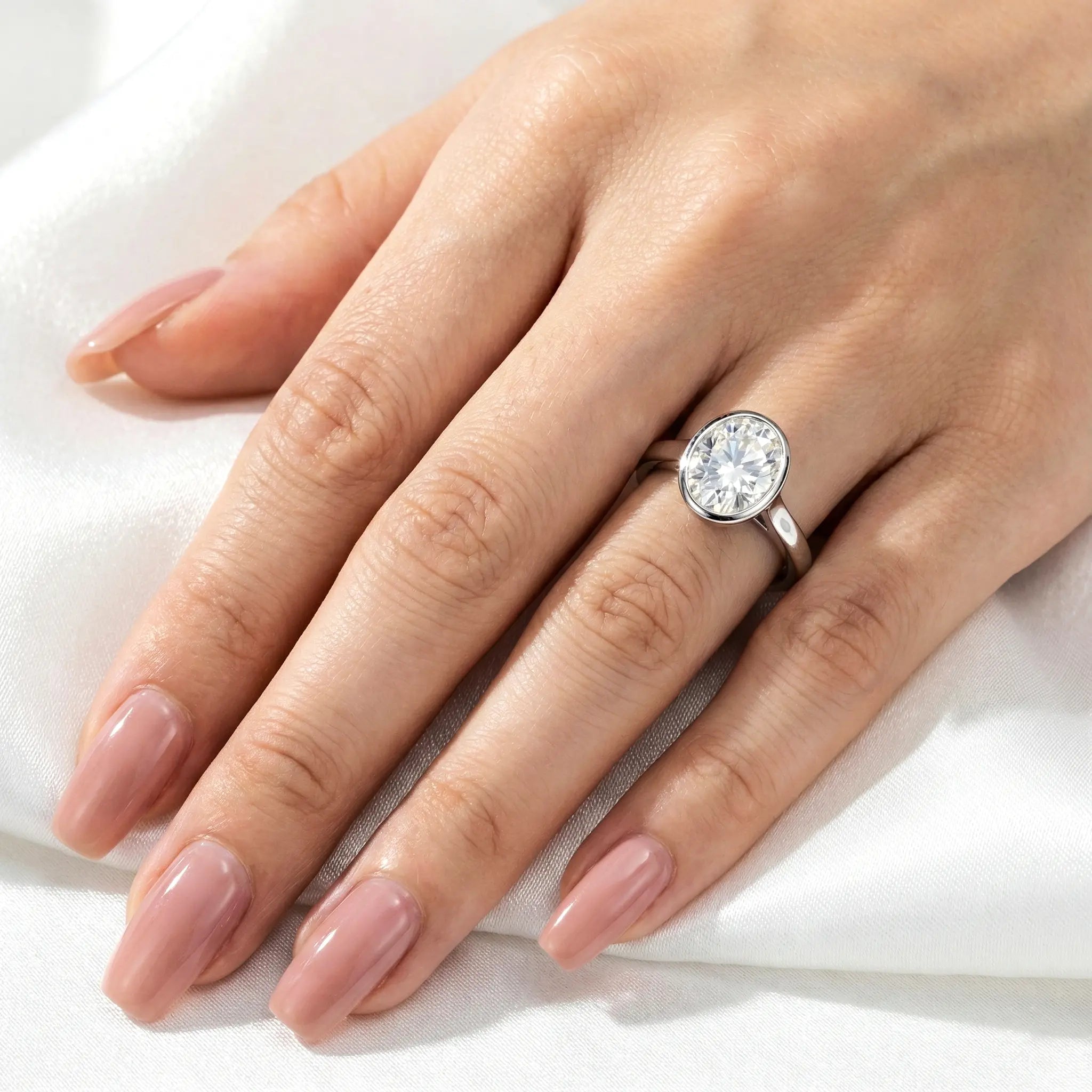 Oval Cut 3 Carat Moissanite Bezel Solitaire Ring Aura Diamonds