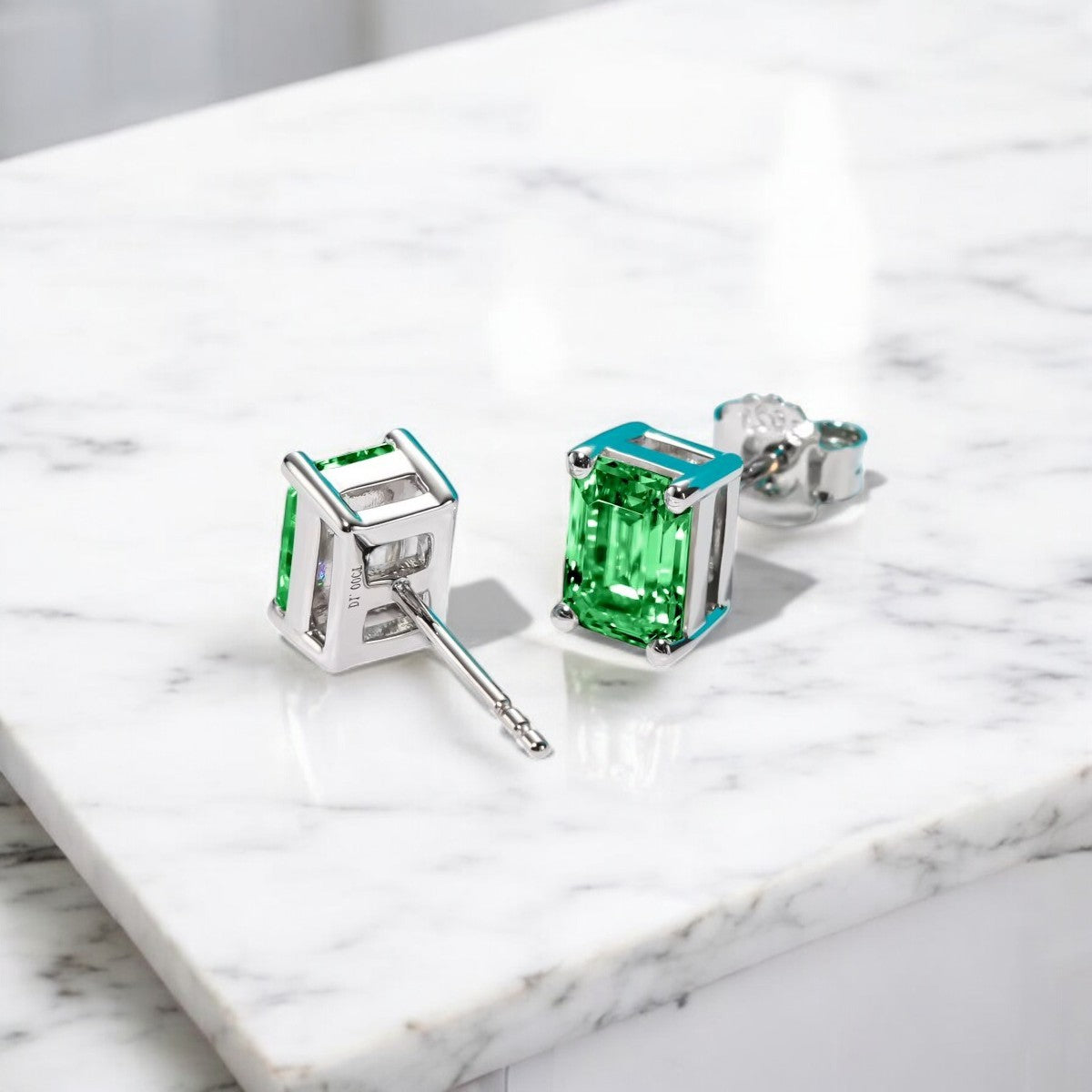 10K White Gold Colombian Emerald Cut Stud Earrings with Sterling Silver Setting | Green Emerald - Luxury Collection Aura Diamonds