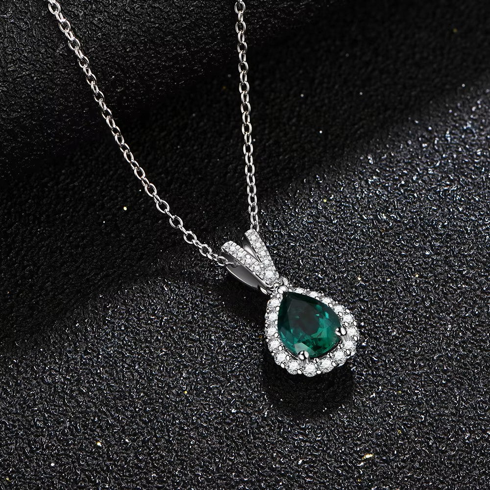 Elegant Pear Cut Emerald Halo Pendant | 1 Carat | Sterling Silver (Rhodium Plated) Aura Diamonds