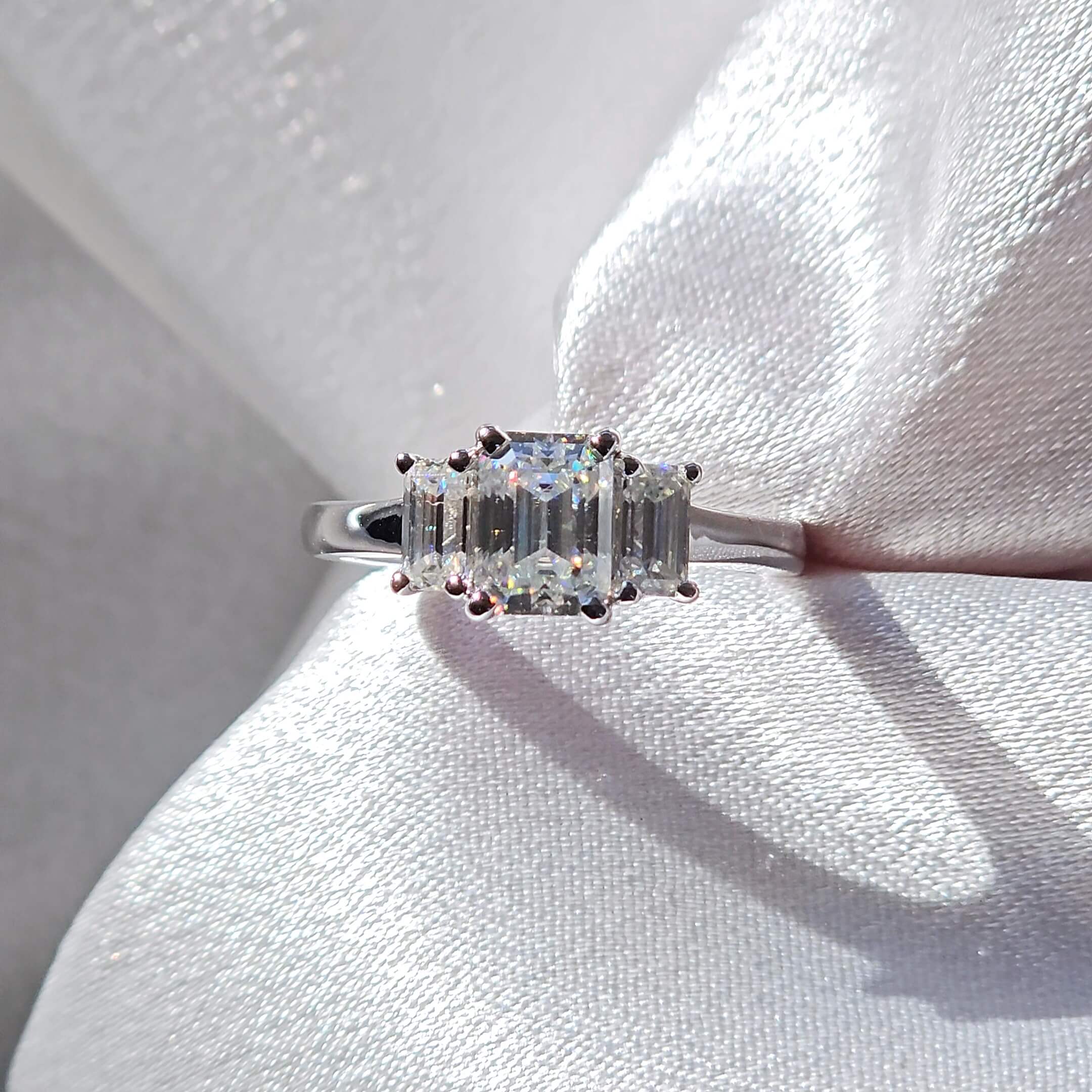 Elegant Trilogy: 1.6 Carat Weight Emerald Moissanite Engagement Ring Aura Diamonds