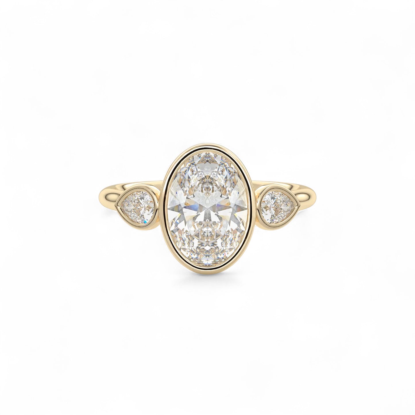The Celine Oval Bezel Three-Stone Diamond Ring
