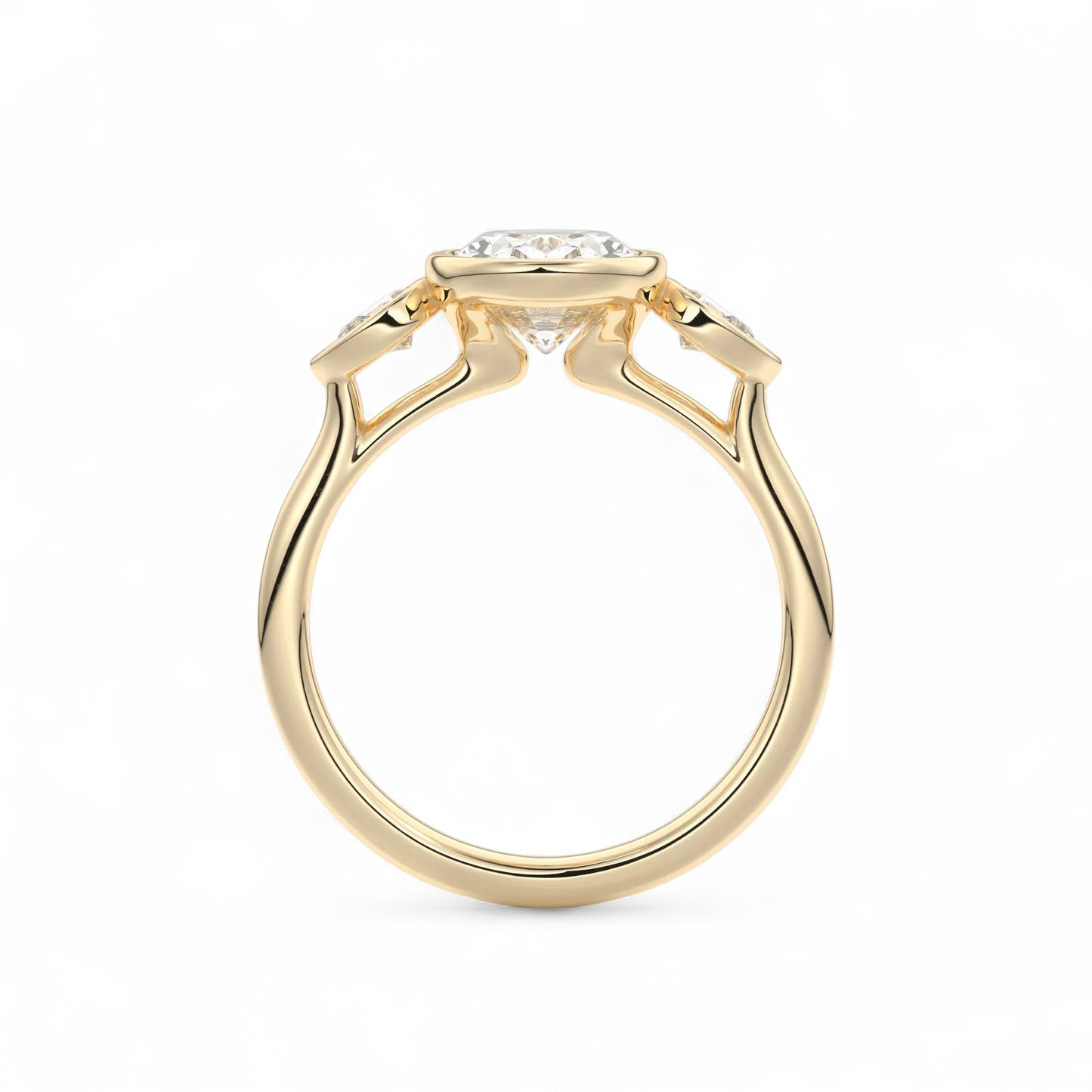 The Celine Oval Bezel Three-Stone Diamond Ring