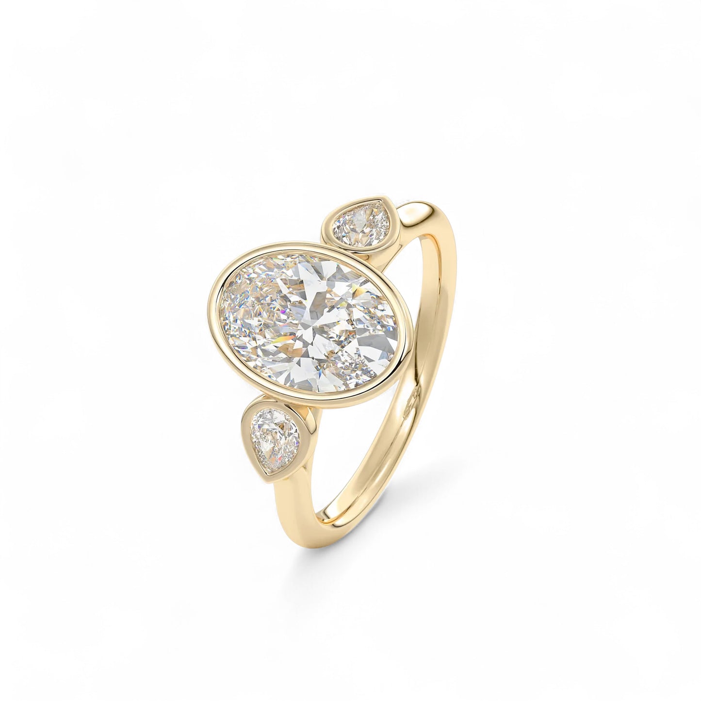 The Celine Oval Bezel Three-Stone Diamond Ring