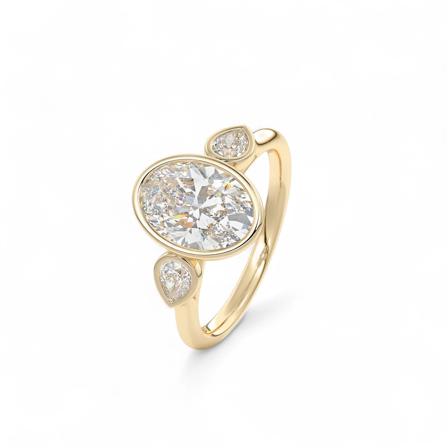 The Celine Oval Bezel Three-Stone Diamond Ring Aura Diamonds