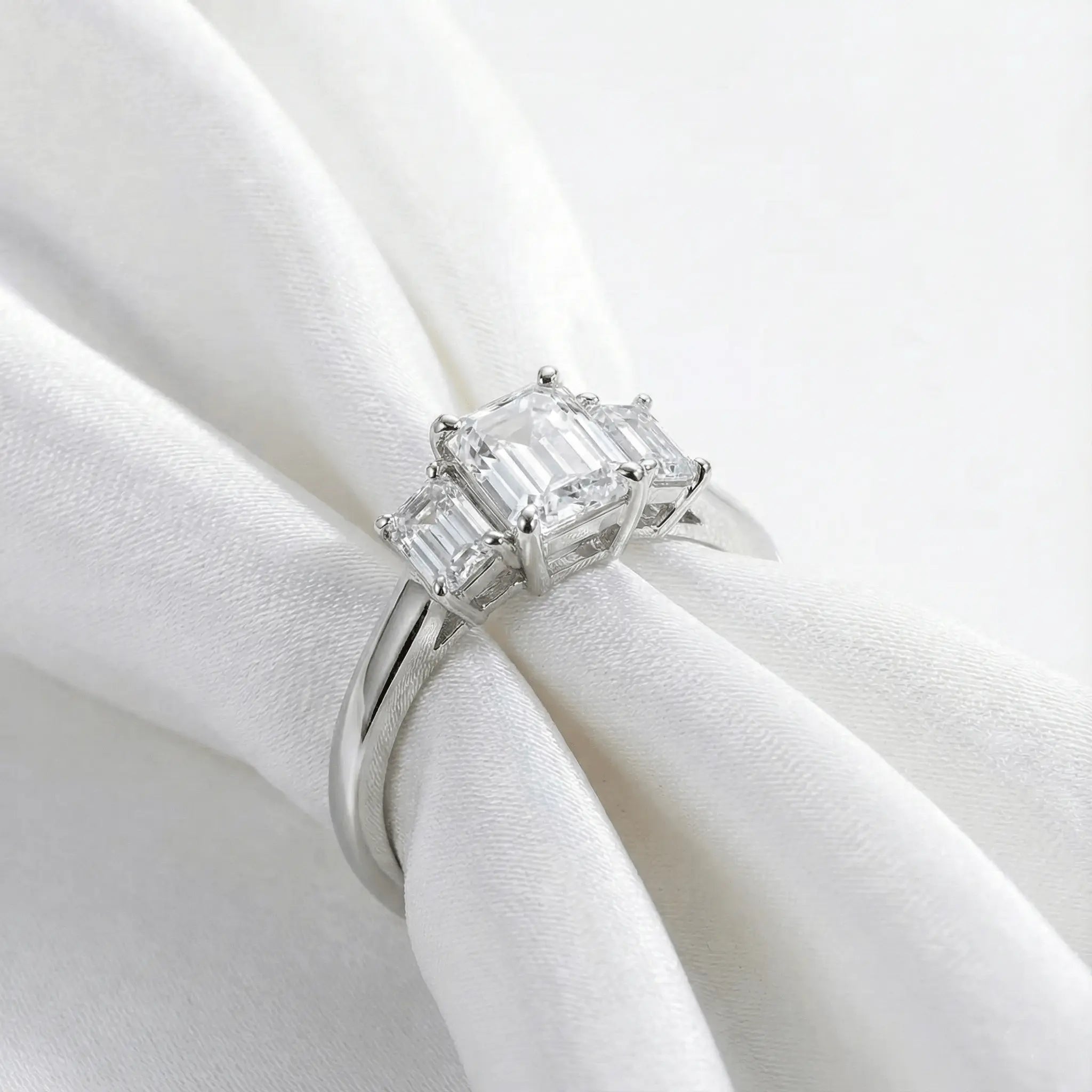 Elegant Trilogy: 1.6 Carat Weight Emerald Moissanite Engagement Ring Aura Diamonds
