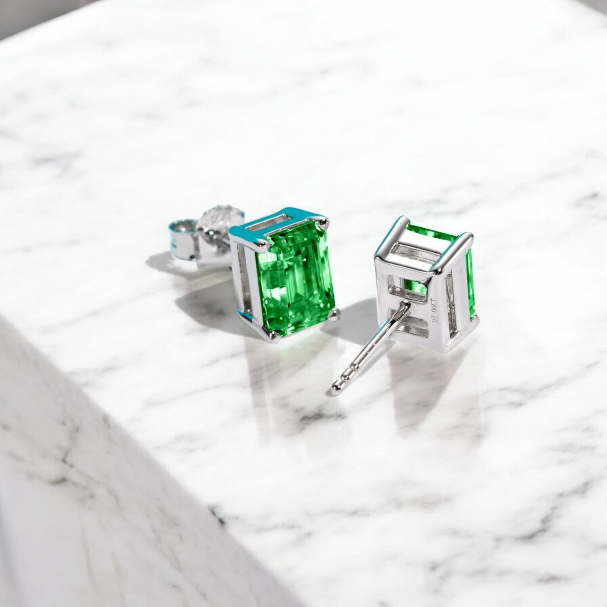 10K White Gold Colombian Emerald Cut Stud Earrings with Sterling Silver Setting | Green Emerald - Luxury Collection Aura Diamonds