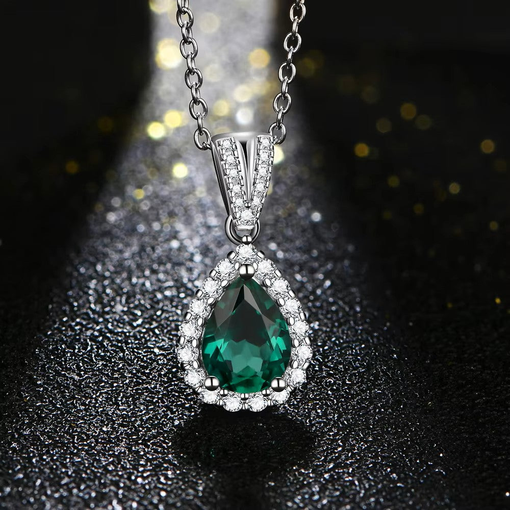 Elegant Pear Cut Emerald Halo Pendant | 1 Carat | Sterling Silver (Rhodium Plated) Aura Diamonds