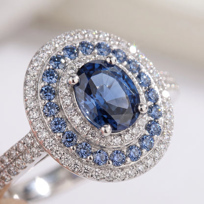 Macro close-up of blue moissanite double halo and pave band