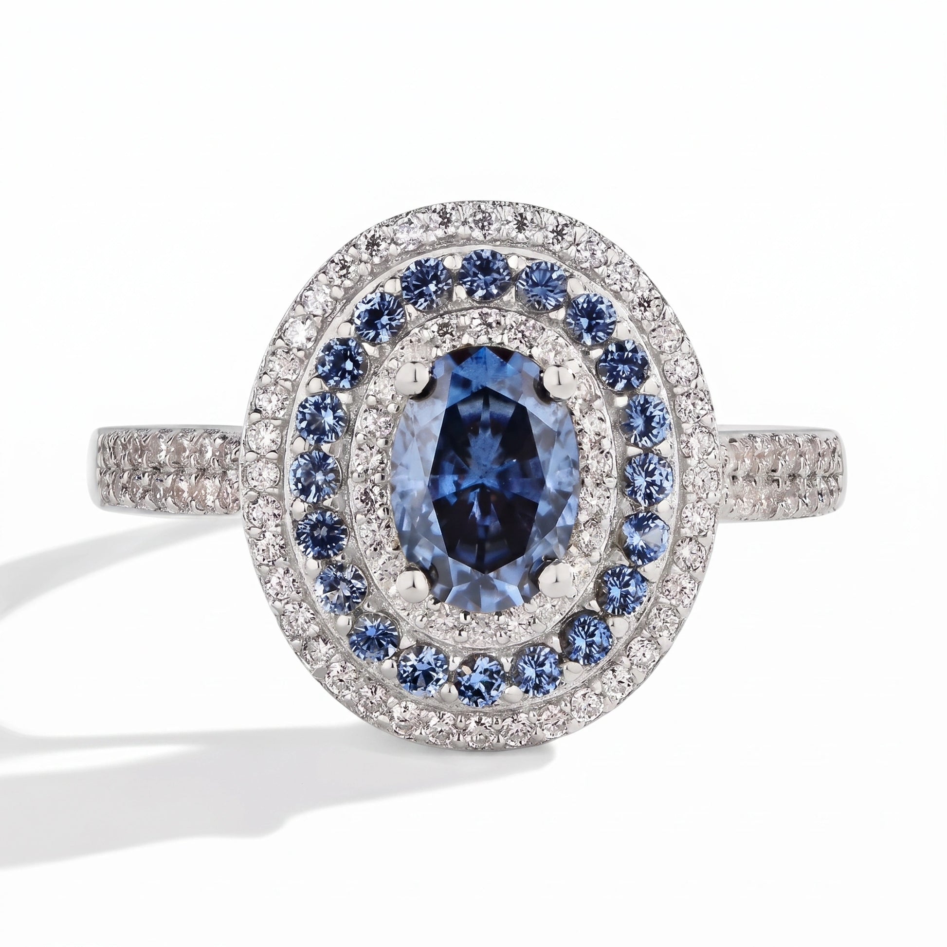 Blue moissanite halo ring, studio product photography