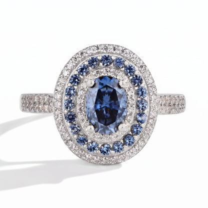 Blue moissanite halo ring, studio product photography