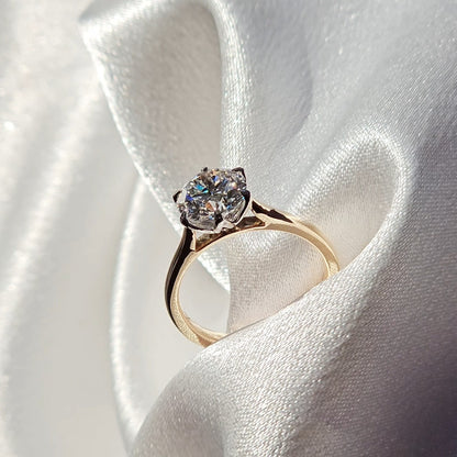 Tulip round solitaire diamond ring worn on the hand