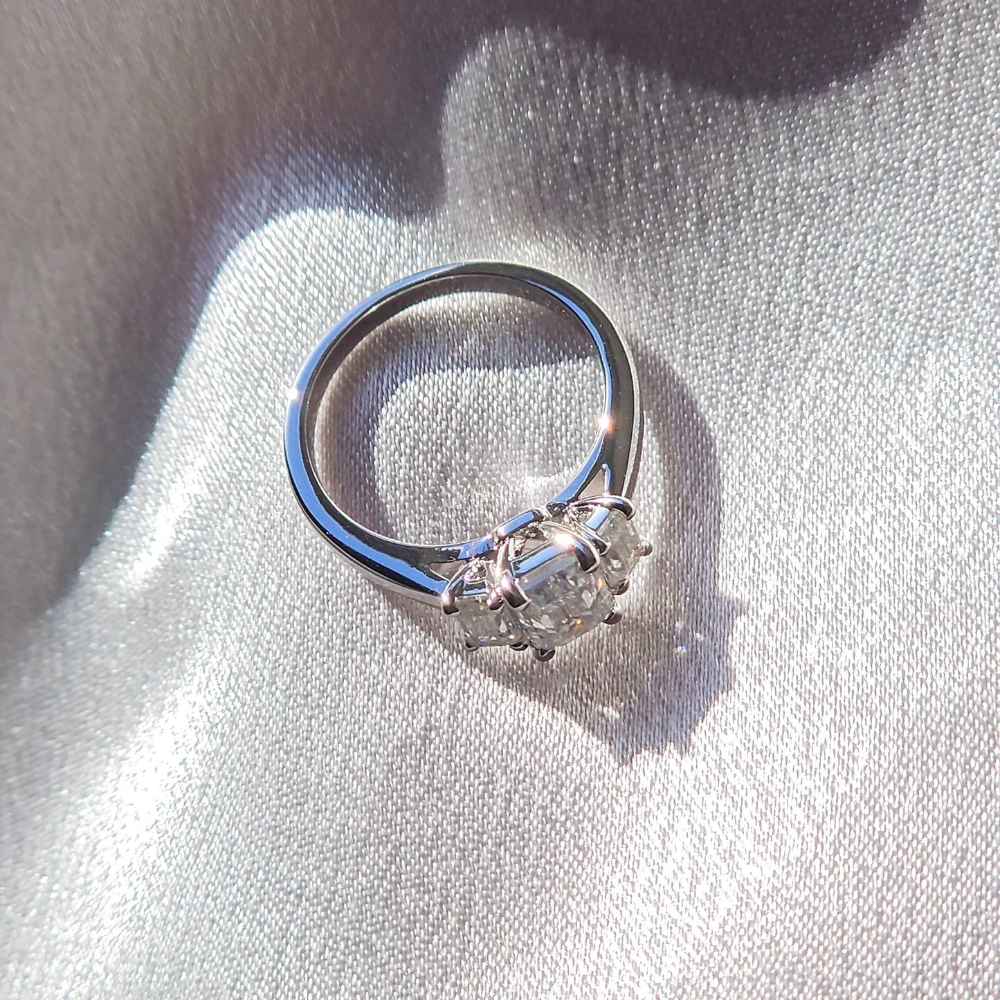 Elegant Trilogy: 1.6 Carat Weight Emerald Moissanite Engagement Ring