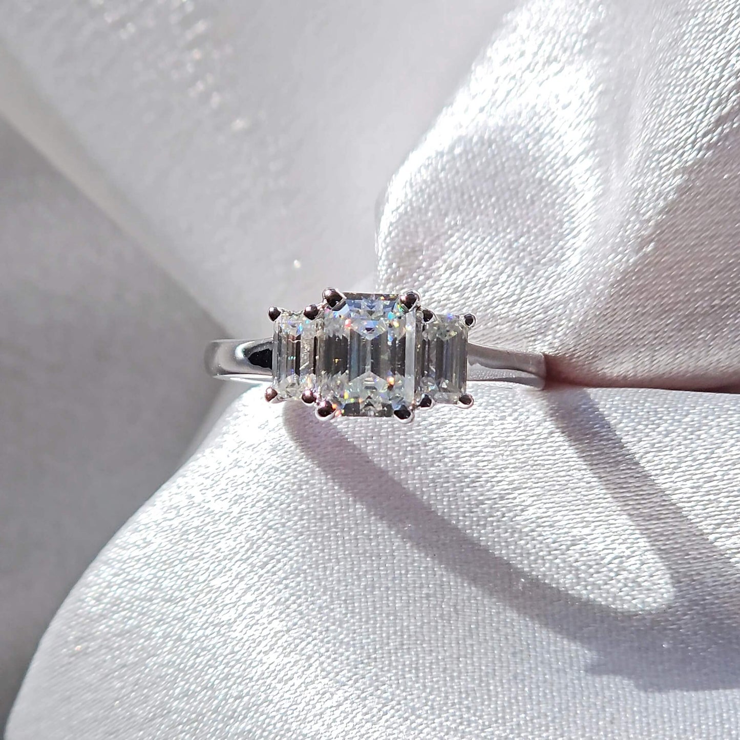 Elegant Trilogy: 1.6 Carat Weight Emerald Moissanite Engagement Ring