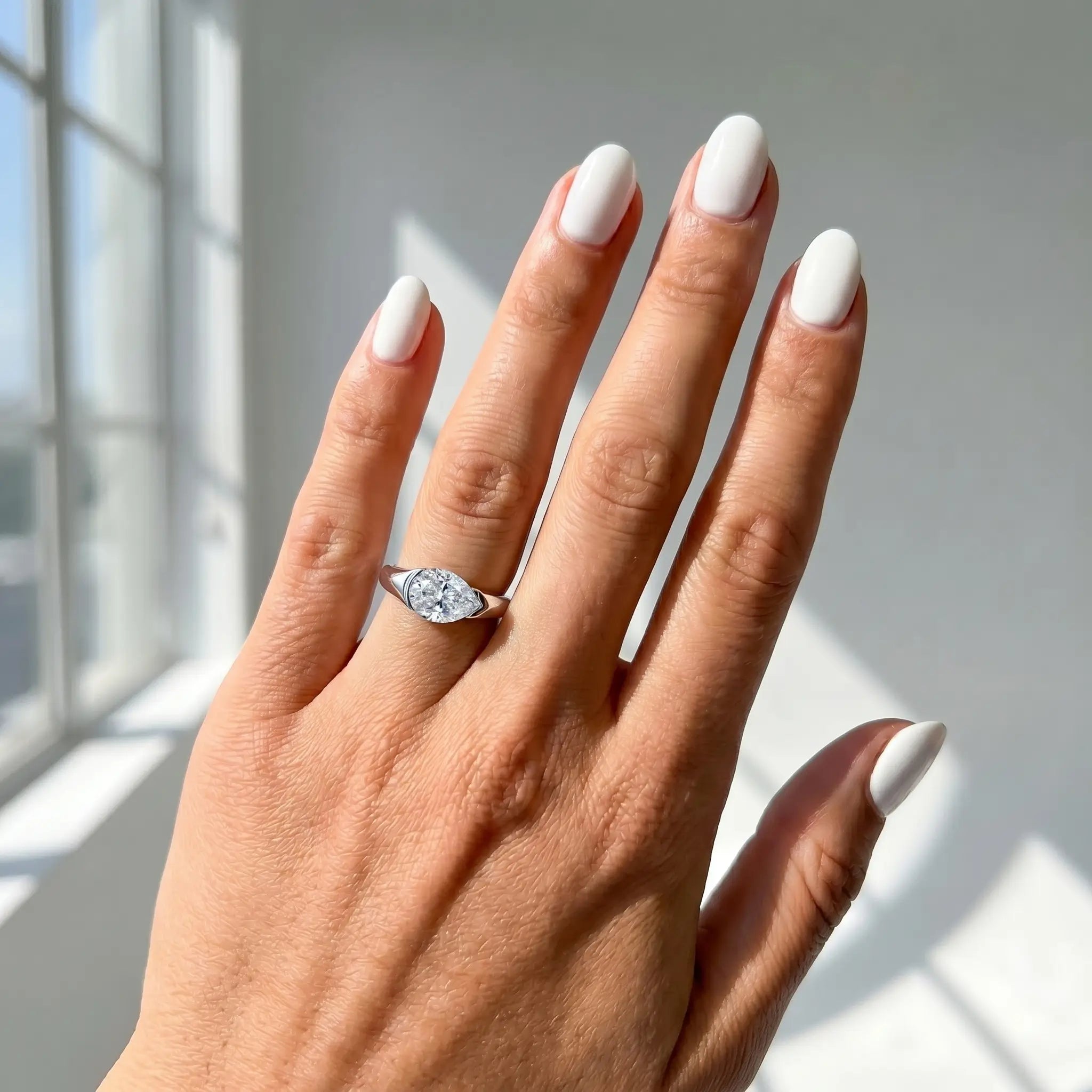 2.5ct East-West Pear Solitaire Moissanite Engagement Ring Aura Diamonds