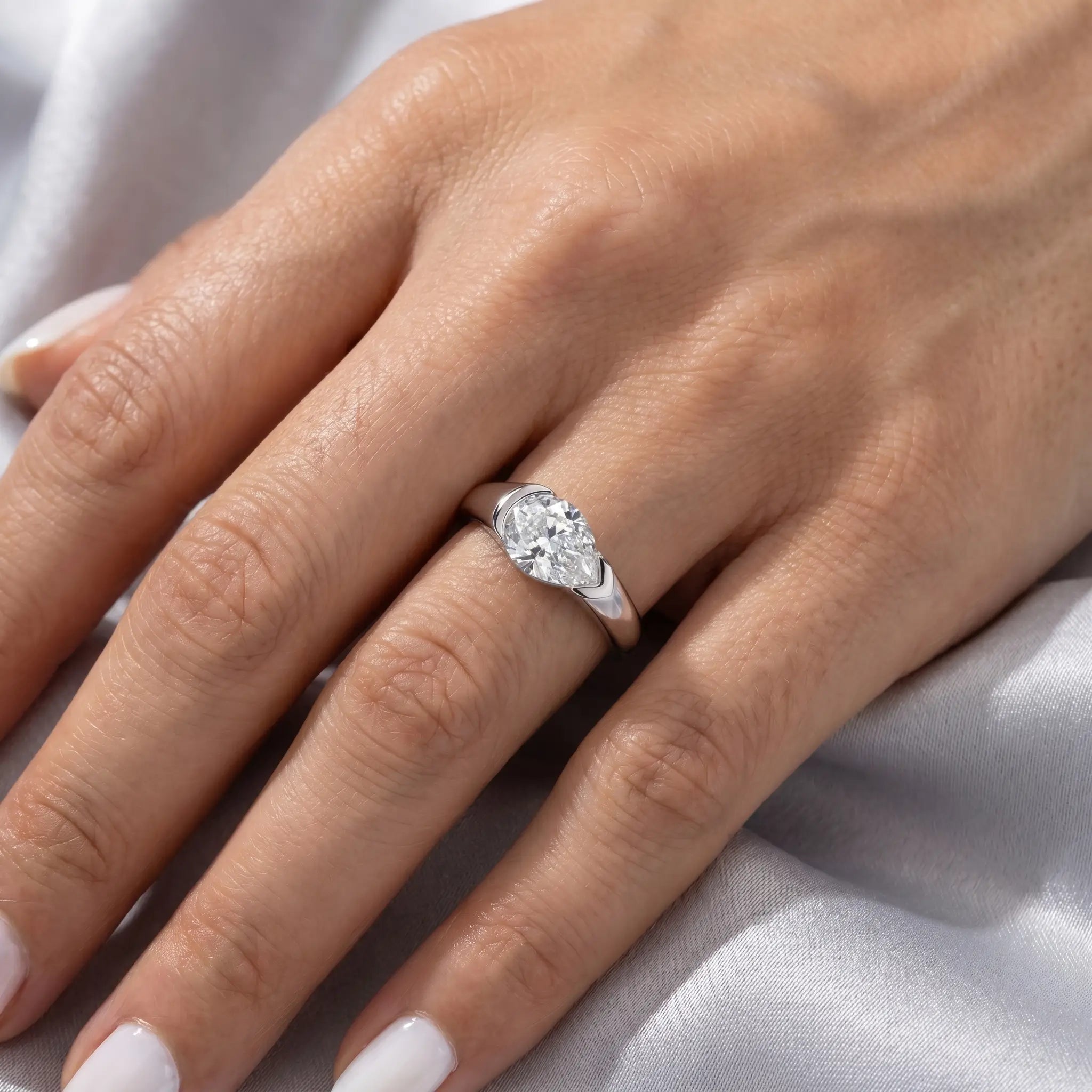 2.5ct East-West Pear Solitaire Moissanite Engagement Ring Aura Diamonds