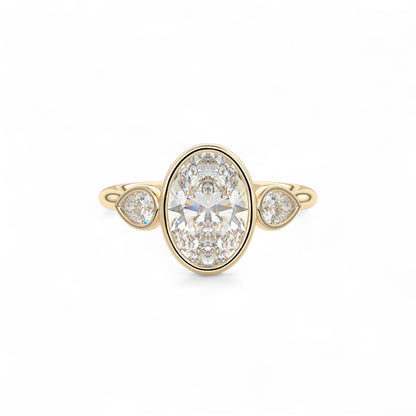 The Celine Oval Bezel Three-Stone Diamond Ring
