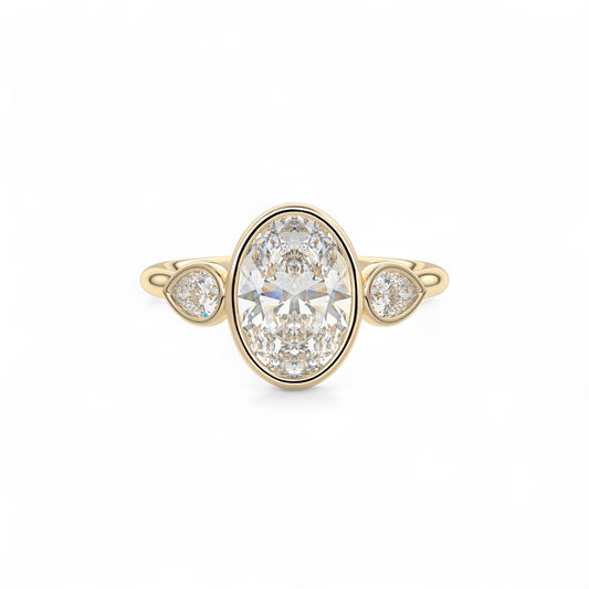 The Celine Oval Bezel Three-Stone Diamond Ring