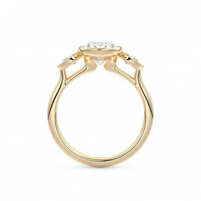 The Celine Oval Bezel Three-Stone Diamond Ring