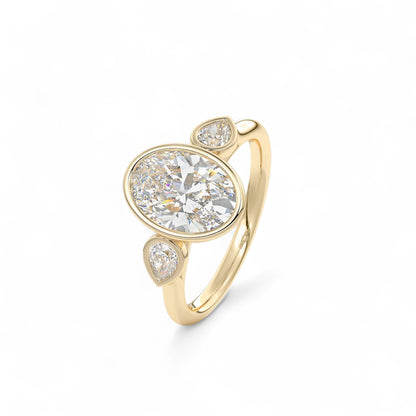 The Celine Oval Bezel Three-Stone Diamond Ring